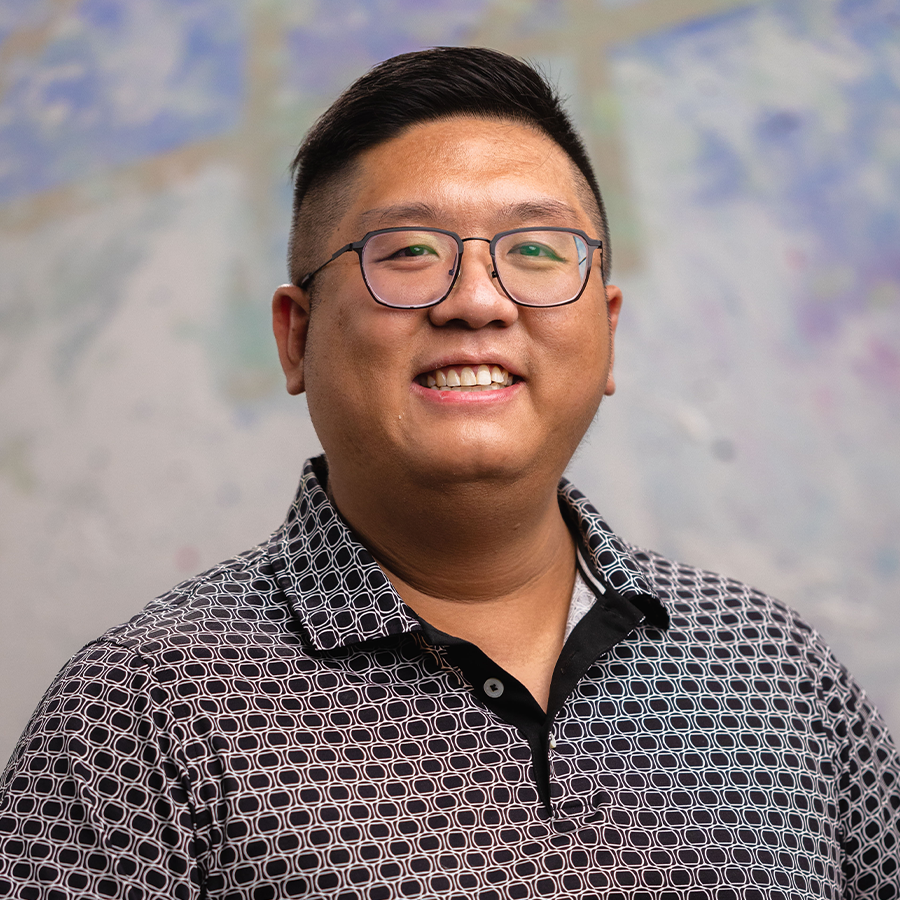 Thomas Truong Administrative Assistant portrait photo smiling